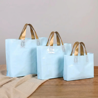 50pcs, 3 sizes light Blue PVC gift bag with Gold handle